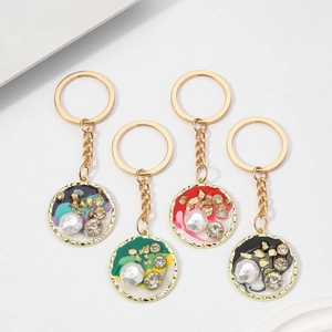 Lussuoso Portachiavi a Pendente Rotondo in Lega Smaltata Con Finta Perla Artificial Strass Foglia Oro per Borsa Donna Regalo