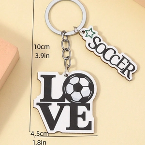Detail of wooden soccer keychain featuring LOVE and SOCCER charms on a silver ring