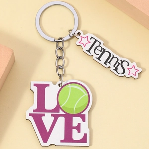 Tennis theme key chain with purple LOVE text and green tennis ball charm for bags