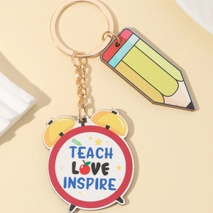 Rainbow pencil and clock keychain with Teach Love Inspire text for teacher appreciation