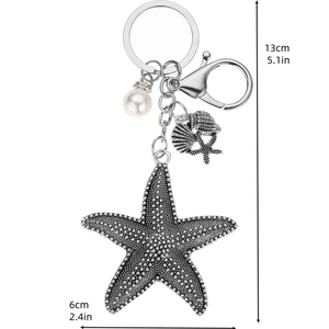 Bohemian starfish keychain with pearls and shells showing 13cm length measurement