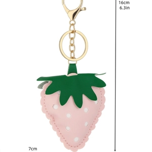 Pink PU leather strawberry keychain with white polka dots and golden metal hook charm
