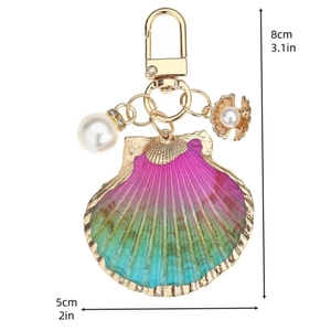 Gradient shell keychain with oversized pearl and golden clip, 8cm tall ocean bag charm