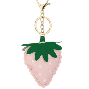 Creative pink PU leather strawberry keychain with gold hardware and green leaf detail