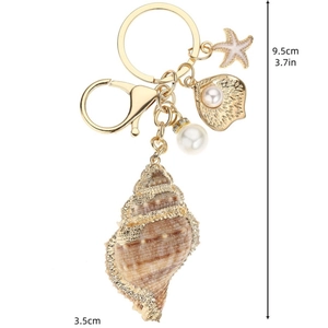 Elegant ocean themed keychain with gold conch shell and white pearl charms, 9.5cm length