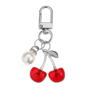 Cute mini cherry keychain featuring red translucent fruit and white pearl with rhinestones