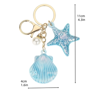 Ocean theme shell keychain with gradient blue acrylic shell and starfish charm, 11cm length