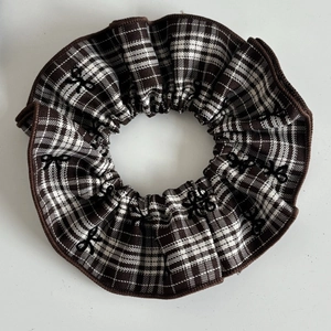Vintage brown and white checkered scrunchie with embroidered black bows and stitching