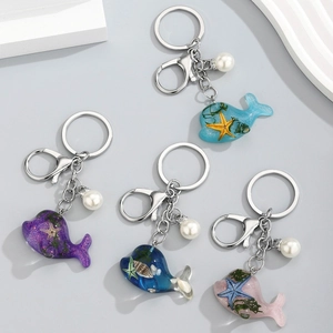 Porte-clés dauphin en résine marine avec étoiles de mer et perles en quatre couleurs