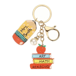Teacher appreciation keychain with apple pencil book charms and elegant gold hardware