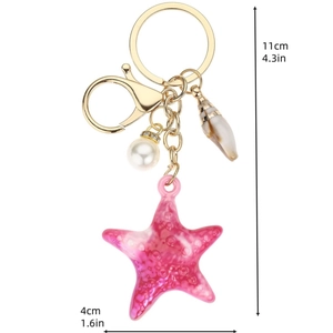 Pink acrylic starfish keychain with pearl and seashell charm, length 11cm width 4cm