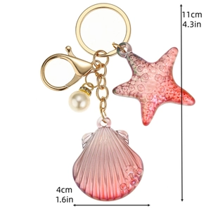 Porte-clés coquillage et étoile de mer coloré avec fermoir doré pour sacs et accessoires