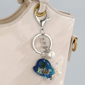 Porte-clés dauphin série océan avec baleine en résine bleue, étoile de mer et perle