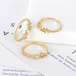 Elegant 18k gold-plated crown ring with zircon crystals shown from a 45-degree angle