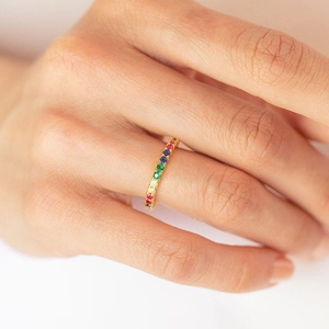 Chic gold plated ring featuring a full circle of rainbow cubic zirconia for men and women