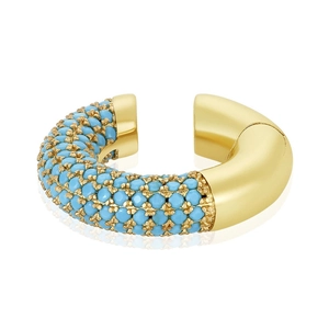 Detail of 18k gold plated ear cuff featuring turquoise beads in a minimalist C-shape