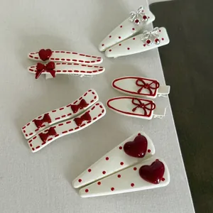 Sweet red and white hair clip set with polka dots, bows and cherry charms for women