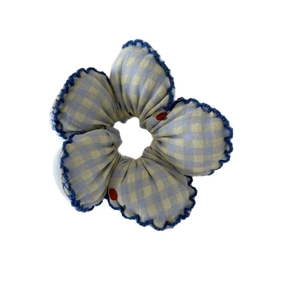 Sweet floral scrunchie with blue checkered cherry pattern and scalloped edges