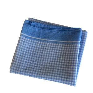 Blue and white checkered cotton square headscarf with fine edge stitching over white background