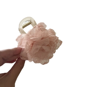 Pink chiffon flower hair claw clip with transparent acrylic base for elegant styling