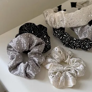 Elegant satin hair accessories set with sparkling rhinestones in black silver and cream white