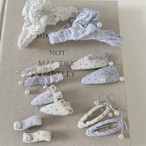 Barrette à Cheveux Coréenne Douce en Tissu Floral Nœud Papillon Fausse Künstliche Perle Épingles à Cheveux Élégantes Femme