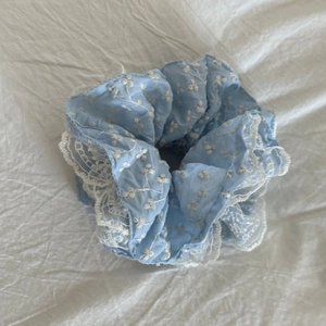Sky blue floral embroidered oversized scrunchie with white lace trim for ponytails