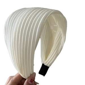 Minimalist white pleated wide headband with a vertical stripe texture for daily wear