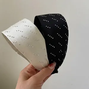 Serre-tête large élégant en tissu avec strass brillants en noir et blanc classiques
