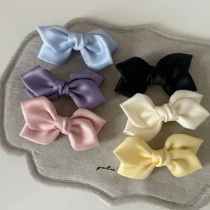 Set of 6 colorful satin bow hair clips in light blue black purple white pink and yellow