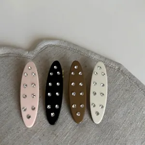 Lot de quatre barrettes à cheveux en acétate avec cristaux aux couleurs de Morandi