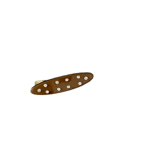 Pince à cheveux ovale en acétate marron avec strass brillants et base en métal doré