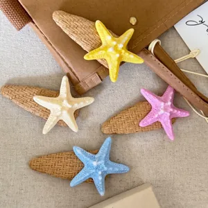 Colorful starfish hair clip set in four shades with woven texture for summer beach styling