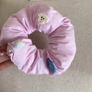 Pink fabric puff scrunchie with cute dog silicone patch and rainbow handmade label
