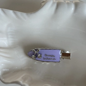 Grape purple enamel hair clip with sparkling rhinestone cherry design on a silver base