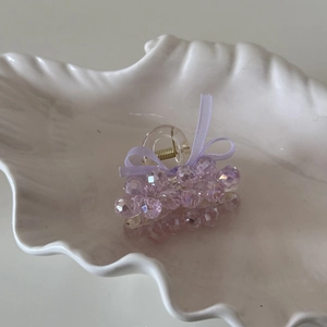 Elegant purple beaded bow hair claw clip with transparent base for women styling