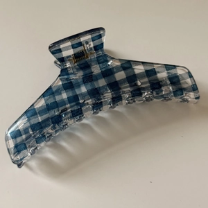 Blue and white checkered claw clip hair accessory with translucent finish for women
