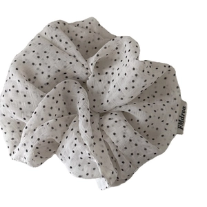 French style white satin scrunchie with black polka dots and woven brand label