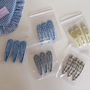 5-pack set of girl's blue plaid and polka dot BB hair clips with fabric patterns