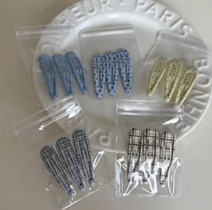 Blue plaid and polka dot BB hair clips set for girls, 15 pieces in diverse patterns