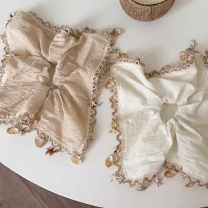 Holiday sea shell and starfish linen scrunchies with lace trim in beige and apricot
