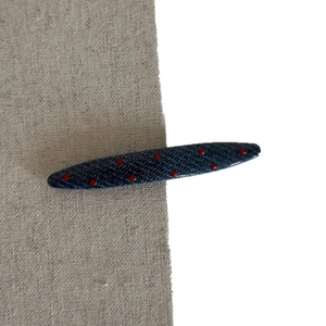 Polka dot denim blue teardrop hair clip with vintage red textured fabric finish