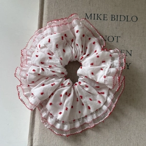 Polka dot scrunchie with red lace edges and white fabric for women hair styling