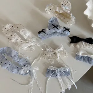 Sweet light blue and white lace bow hair clips with black polka dots and pearls