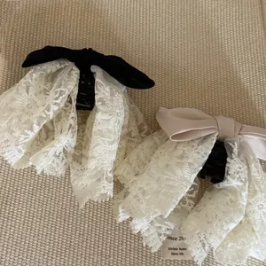 Pinces à cheveux élégantes avec nœud en dentelle et satin noir et rose pour femme