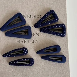 Vintage navy blue polka dot hair clip set with eight fabric covered metal hairpins