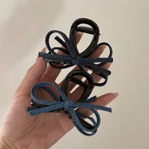 Set of vintage denim bow hair claws with high-quality blue fabric and black glossy finish