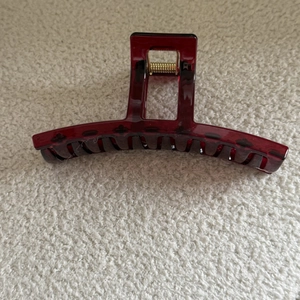 French style burgundy large acrylic hair claw clip with golden metal spring on white wool