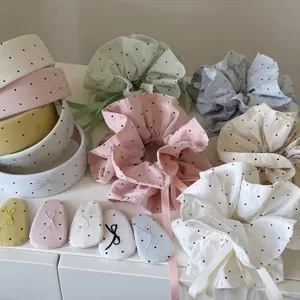 Pastel polka dot hair accessories set including headband, scrunchie and embroidered clips