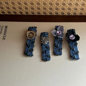 Vintage denim fabric hair clips set featuring metallic smiles and floral detail accents
